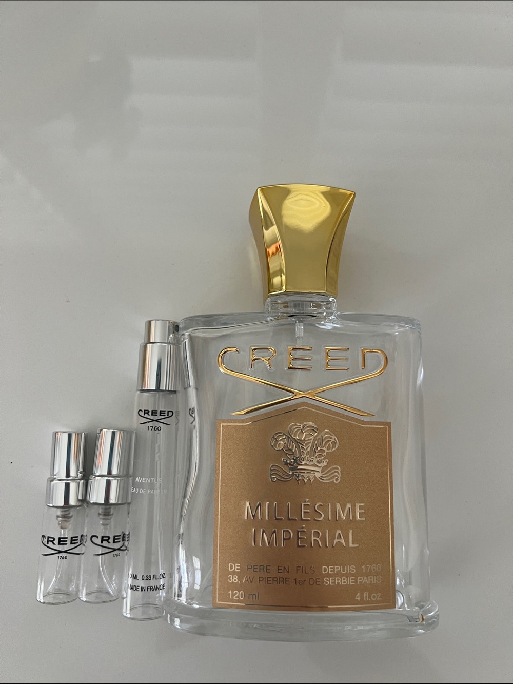 Creed Millésime Impérial Perfume Bottle - Gold & Clear empty bottles.
